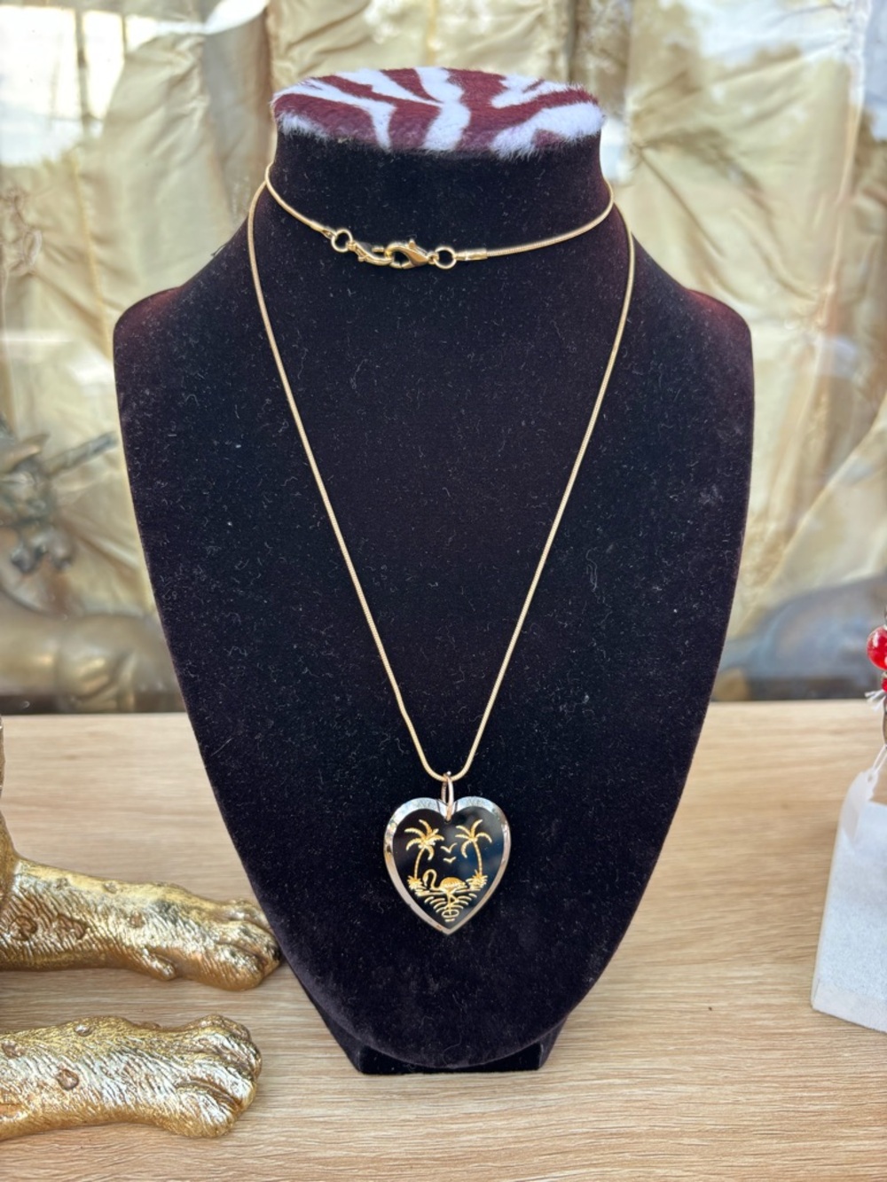 Gold Heart Pendant Necklace with Black Enamel Palm Design